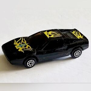 Vintage Yatming FERRARI 308 GTO Black/ Yellow Flames Die-Cast 1:64 Car. The imag